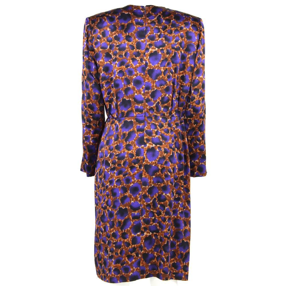 1980s Pierre Balmain printed brown and purple silk dress. This item features v-neckline, wrapover skirt and long sleeves with shoulder pads. There is a back concealed zipper. Good condition.
Measurements:
height: 103 cm
bust: 45 cm
waist: 38 cm