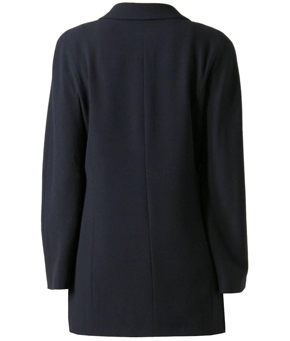 Chanel classic blazer in dark blue wool, frontal buttons closure, two frontal pockets with flap and straight hem. Lightly padded shoulders. The item is vintage, it was produced in 1999 and is in very good conditions.
Length: 78 cm
Bust: 46