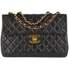 1980s Chanel Vintage Maxi Jumbo Black Leather Bag