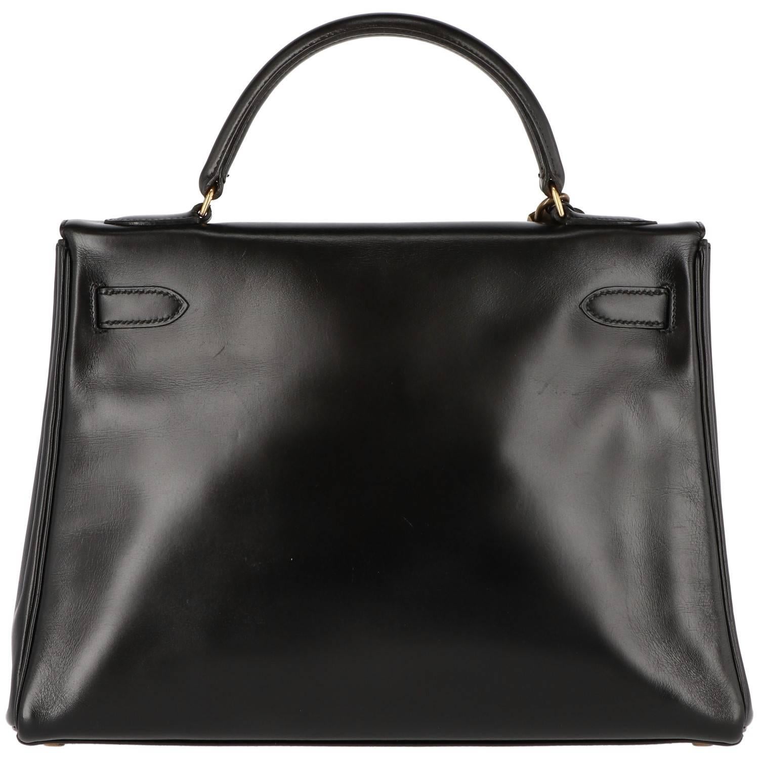 Women's or Men's 1980s Hermès Vintage Black Leather Kelly Bag