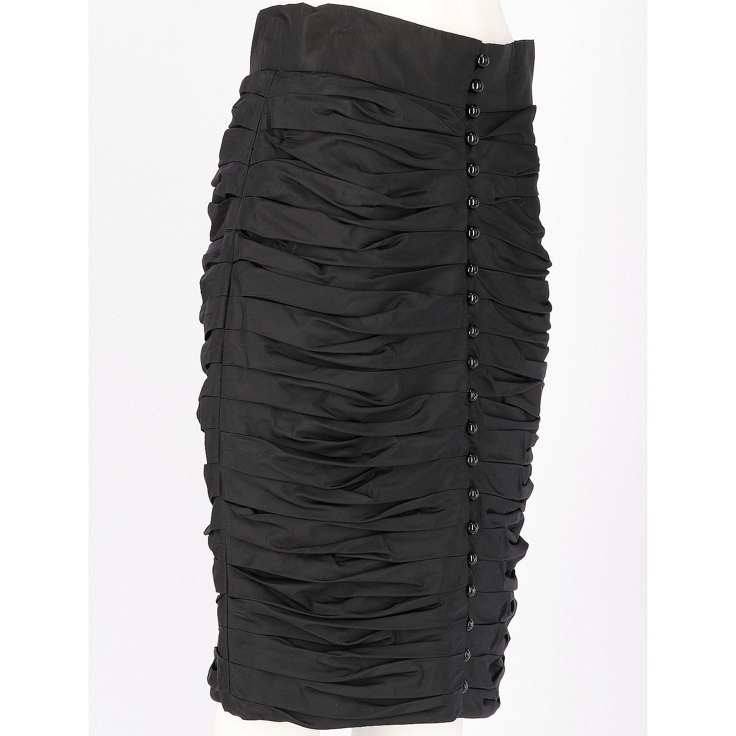 Refined Lanvin black viscose ruched pencil skirt. It features a full-length front button fastening and soft gathered fabric. The item is vintage, it was produced in the 80s and is in very good conditions, it has been subjected to a modification