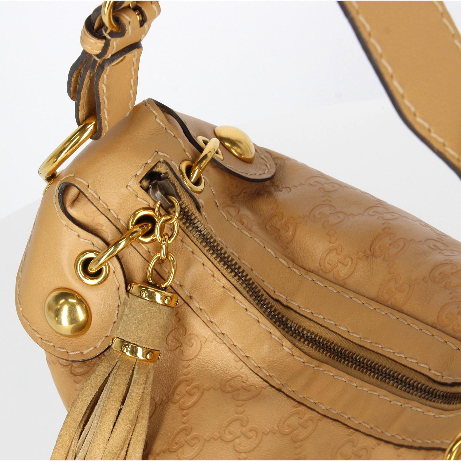 Gucci beige leather bag 1