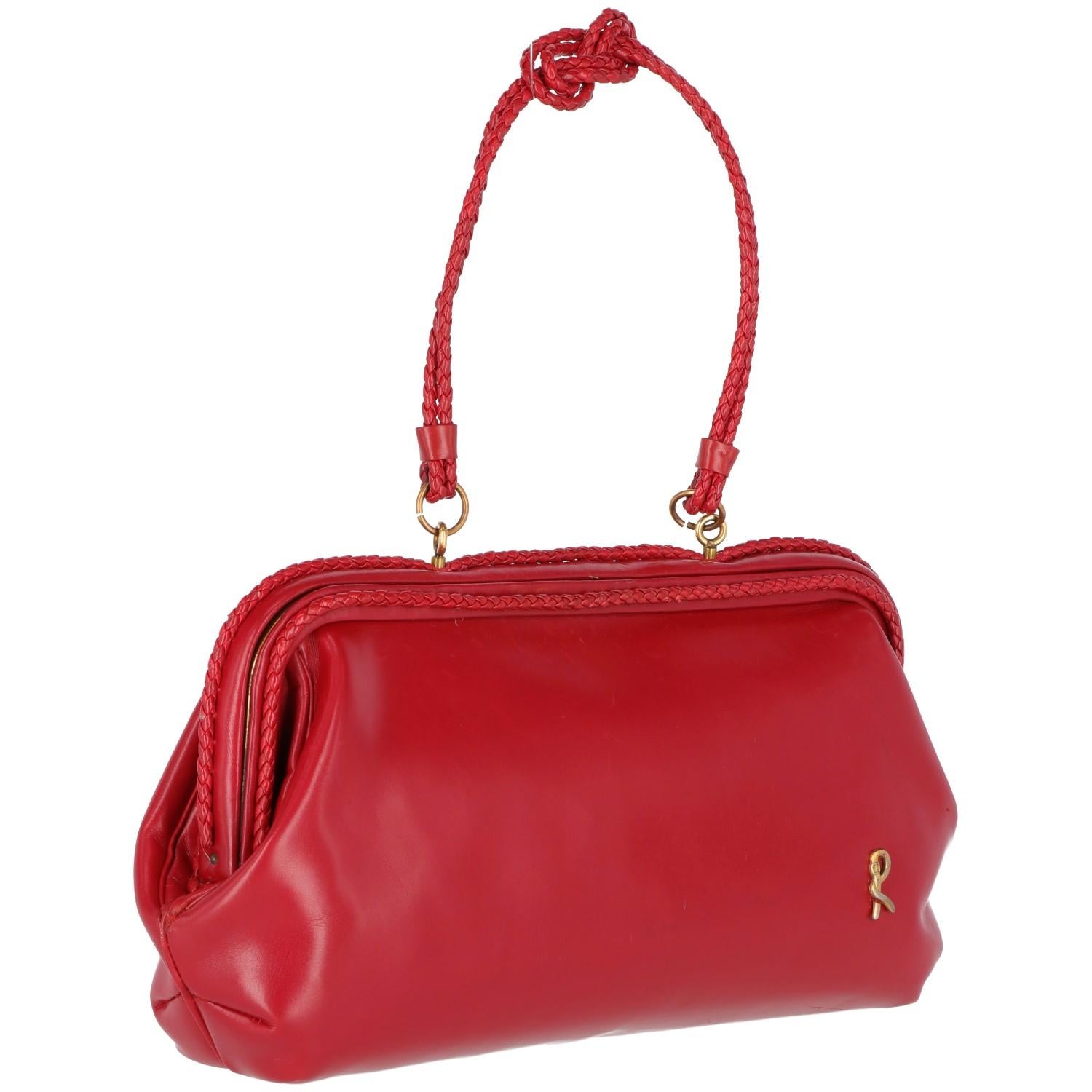 The Roberta di Camerino red leather bag is made in Italy and from 60s collection. 
With gold-tone metal closure, the red braided decorative leather is on the handle and on the bag edges. There are  a gold-tone logo on the front and three inner