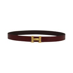 2015 Hermes belt. Reversible leather Noir/rubis Gold Hardware