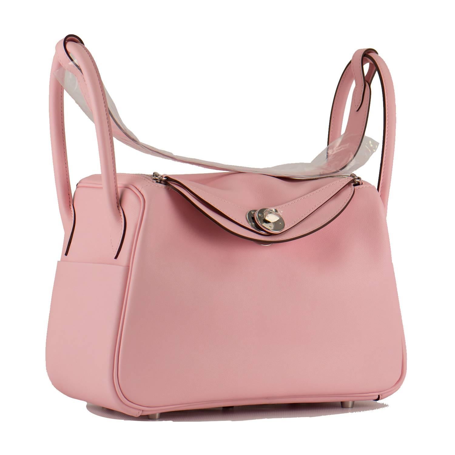 Hermes Handbag Lindy 26 Veau Swift Leather 3Q Rose Sakura Palladium Hardware 2016.

Pre-owned and never used.

Bought it in Hermes store in 2016.

Model: Lindy

Stamp; X

Color: 3Q Rose Sakura.

Details:
*Protective felt removed for
