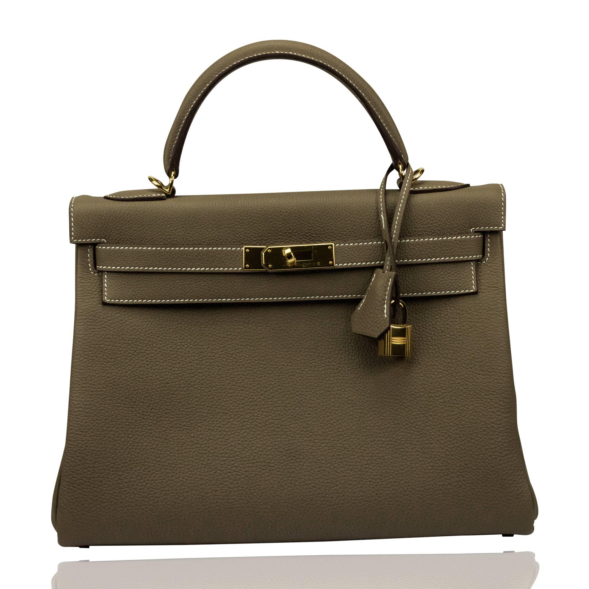 Hermes Kelly II Bag 32 Retourne Togo Leather 18 Etoupe Color GHW 2017

Pristine condition. Pre-owned and never used

Bought it in Hermes store in 2017

Model: Kelly Bag II

Composition: Togo leather

Color: 18 Etoupe

Hardware: Gold

Stamp: