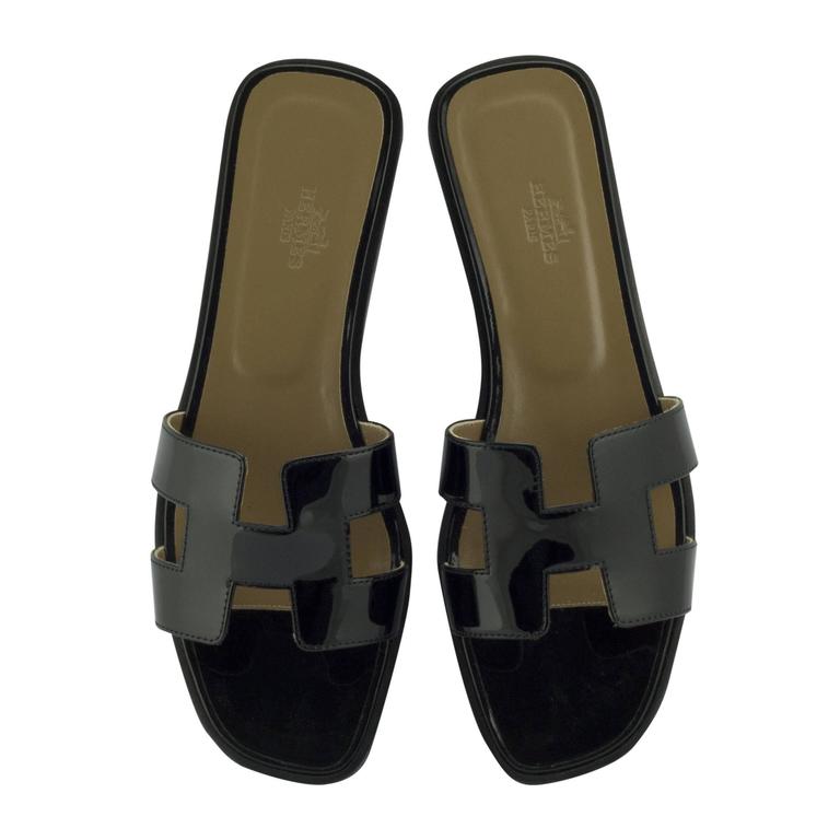 Hermes Woman Sandales "Oran" Patent Leather Black Color 8 Size For Sale at  1stDibs | hermes patent leather sandals, hermes 8u color, hermes sandale