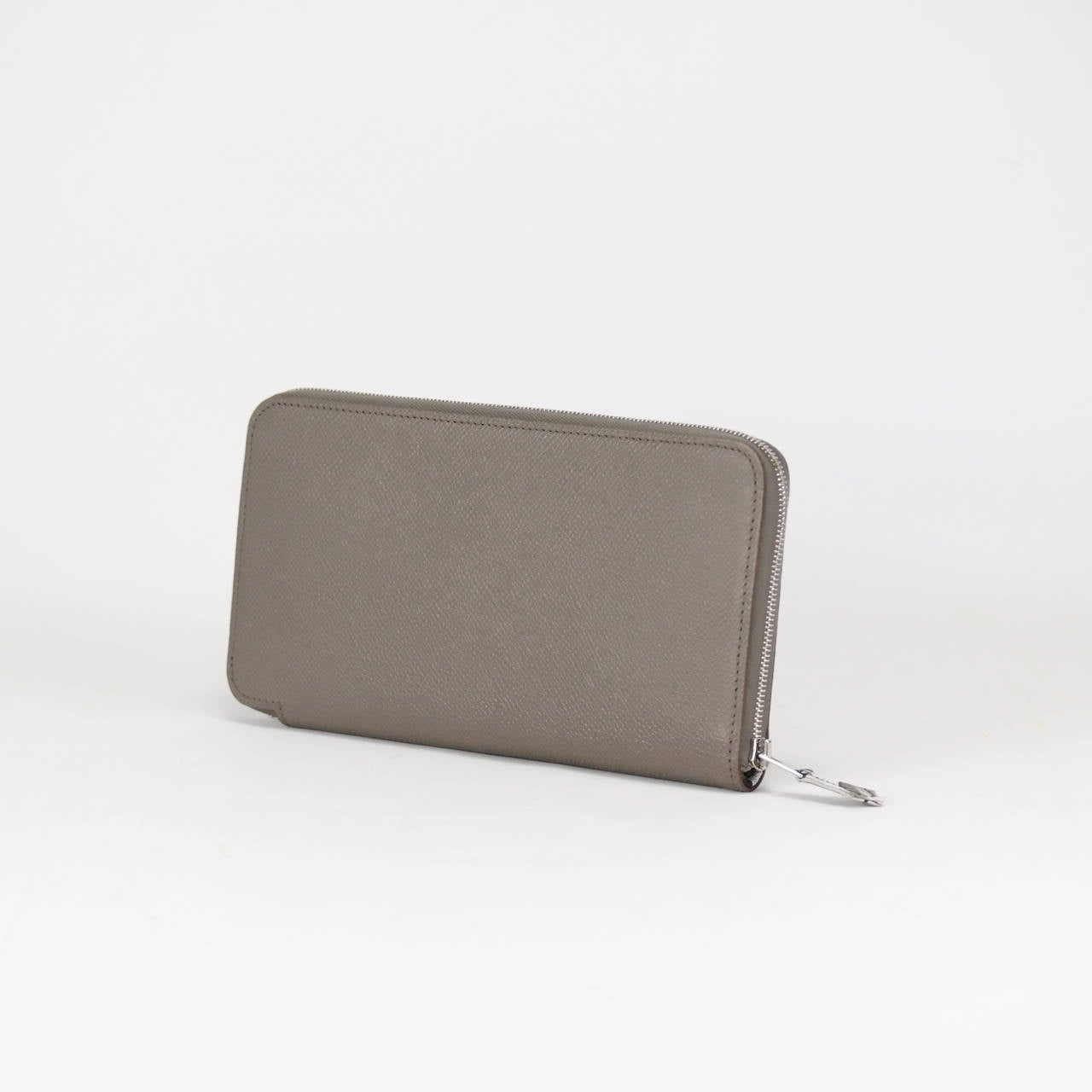 Hermes Wallet AZAP ETAIN Epsom Brasil PALLADIUM Hardware

Pre-owned and never used

Dimension: 20cm width x 10cm height x 2cm length

Color:  ETAIN

The Retail Price in store is 805€. We sell it for 740€.

Details:

With the protective