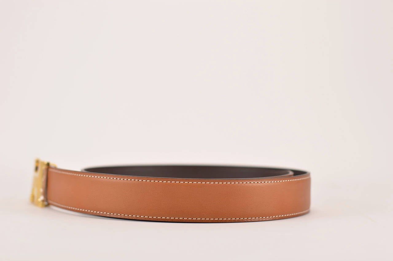 HERMES 2015 BELT BARENIA LEATHER CHOCOLAT 85CM GOLD HARDWARE REVERSIBLE

Pre-owned and never used Bought it in herm store in 2015.

Size; 85CM

Color; LEATHER & CHOCOLAT

Model; H 

-Original Invoice.

-Shipment and Insurance, 100%