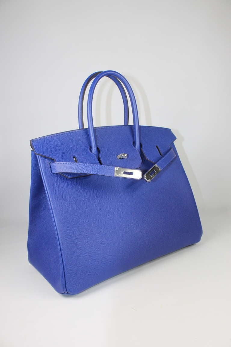 Birkin 30 cm, Blue electric.
Comes with original box, dustbag, clochette, lock, two keys, felt, rain cover, clochette dustbag, and care booklet.
*Protective felt removed for purposes of photography only. 

Bought it in Hermes Store in