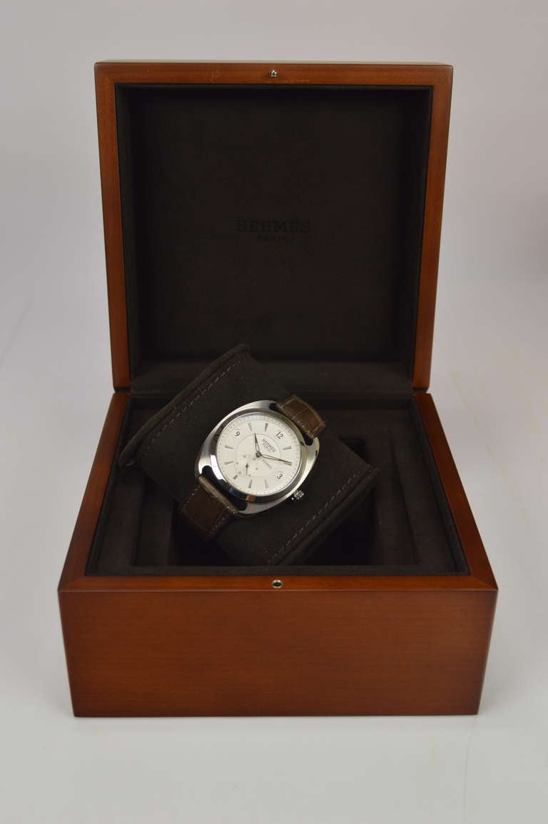 Hermès Dressage Watch alligator havane strap.
Purchased on Hermes Store on 2013
Never carried!!!
Comes with original box and stamped Hermes® warranty 

-Original Invoice.
-Shipment and Insurance, 100% Safe.
-Sold with invoice