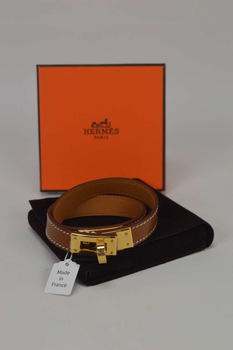 Hermès Kelly Double Tour bracelet Barenia Leather Gold Plated Hardware
Bought it in Hermès Store in 2014
Never carried.
Comes with original box and dustbag.

Store Retail Price 562,80$. We sell it for 478,00$

-Original Invoice.
-Shipment