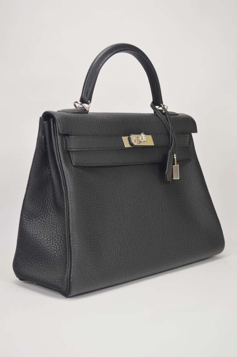 HERMES Kelly handbag black, Hardware palladium. 
Very soft to the touch. Nice and very elegant.
Purchased on Hermes Store on 2014
Original Invoice and packaging
Shipment and Insurance Included
100% Safe
1. Sold by company with invoice,
2.