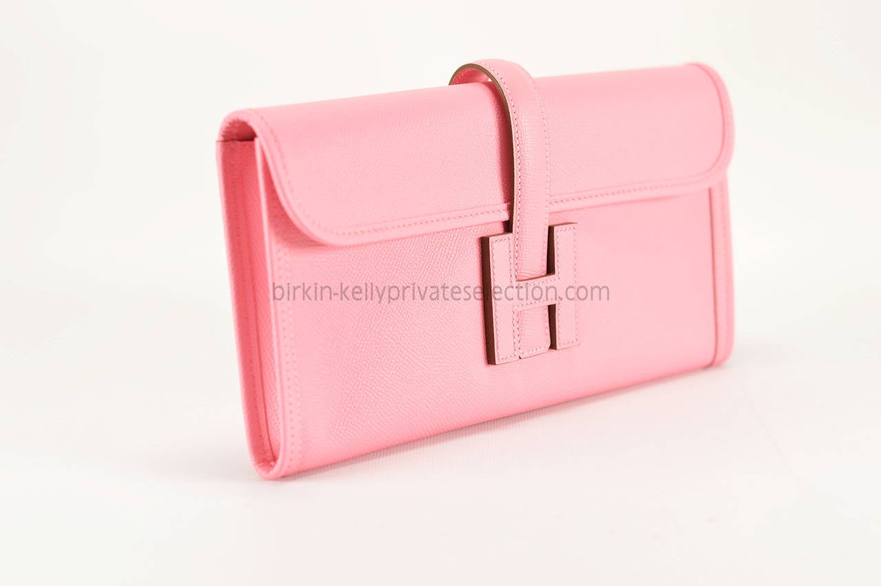 Hermes Wallet JIGE ELAN 29 EPSOM PINK CONFETTI 2015.

Pre-owned and never used.

Bought it in herm store in 2015.

Model:   KELLY  CLASIQUE.

Dimension: 29cm width x 15cm height x 2.5cm length

Color:  ROSE CONFETTI.

Details:

With