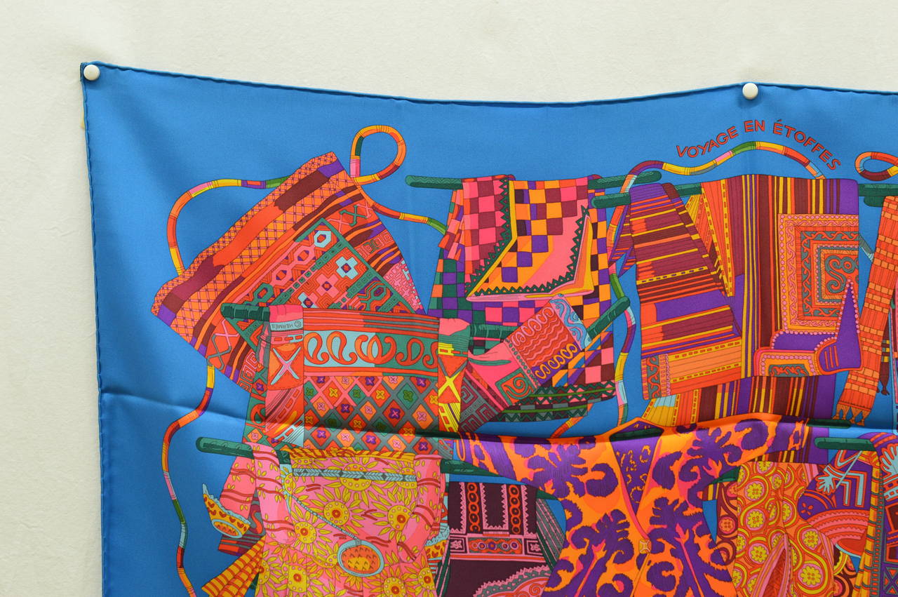 Hermès Carré "Voyage en Etoffe"  Cobalt/Orange/Violet 100%Silk.
