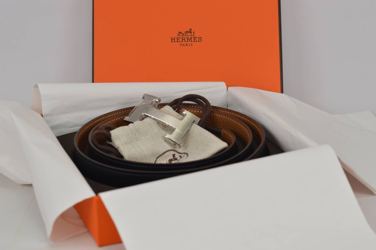 2014 Hermes belt. Reversible leather black/gold Palladium Hardware 1