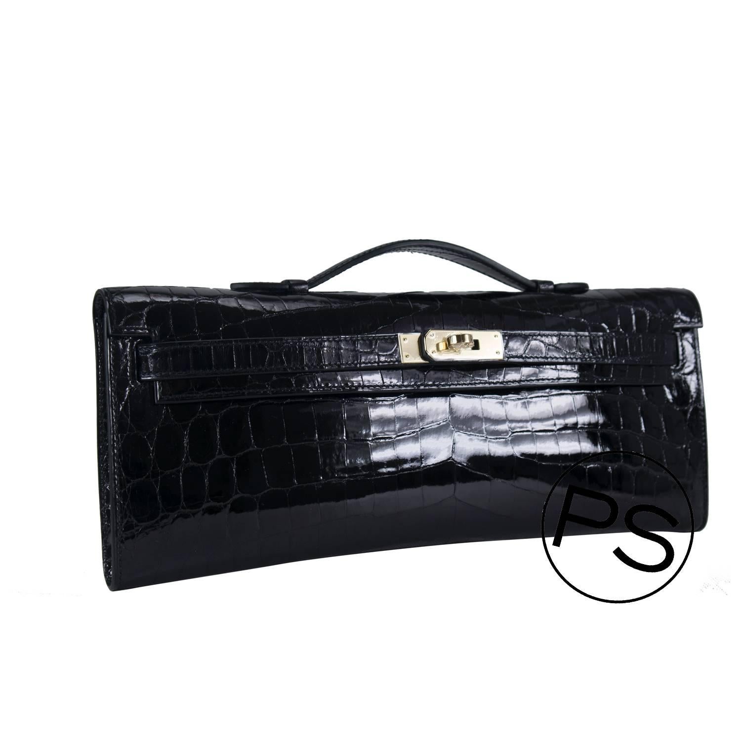 Hermes  Kelly Cut Crocodile Niloticus Black Gold Hardware 2015.

Bought it in Hermes store in 2015.

Pre-owned and never used.

Model: Kelly Cut.

Color: Black.

Size: 23high x 32width x 10.5deep in cm.

Details:

*Protective felt
