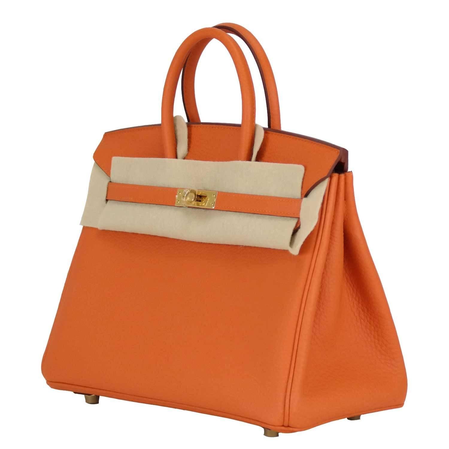 Hermes Birkin 25 Togo 93 Orange Gold Hardware 2016

Pre-owned and never used.

Bought it in Hermes store 2016.

Model: Birkin

Size; 25cm width x 20cm height x 13cm length.

Color: Orange

Details:
*Protective felt removed for purposes