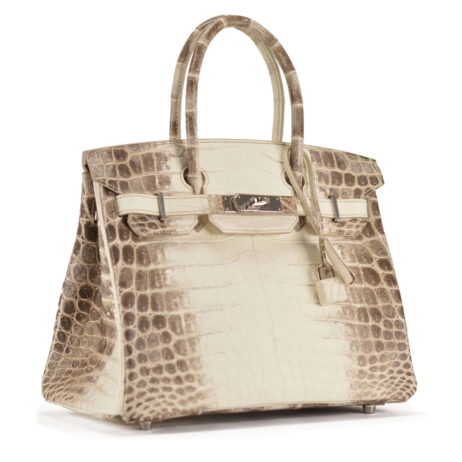 Birkin 30 Himalaya Crocodilus Niloticus 2016

Bought it in Hermes store in 2016.

Pre-owned and never used.

Model:Birkin.

Dimension: 30cm width x 22cm height x 16cm length.

Leather: Crocodile.

Color: Himalayan.

Stamp: