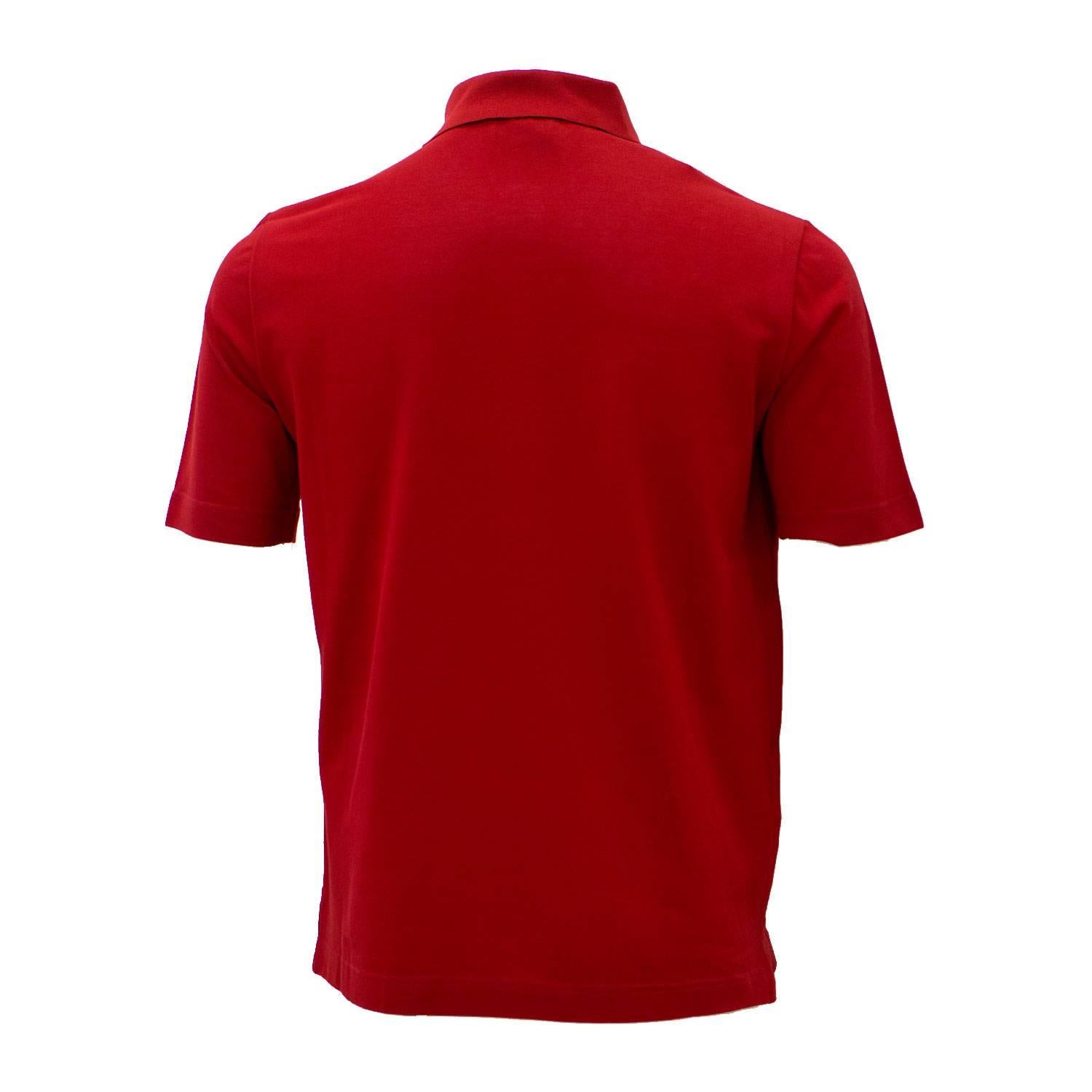 Hermes Polo Boutonne Pique Cotton Size M Color Rouge Vif 2016.

Pre-owned and never used.

Bought it in hermes store in 2016.

Size; ME

Composition: Cotton.

Color; Rouge Vif.

Model; Polo Boutonne Pique

Details: 
- Original