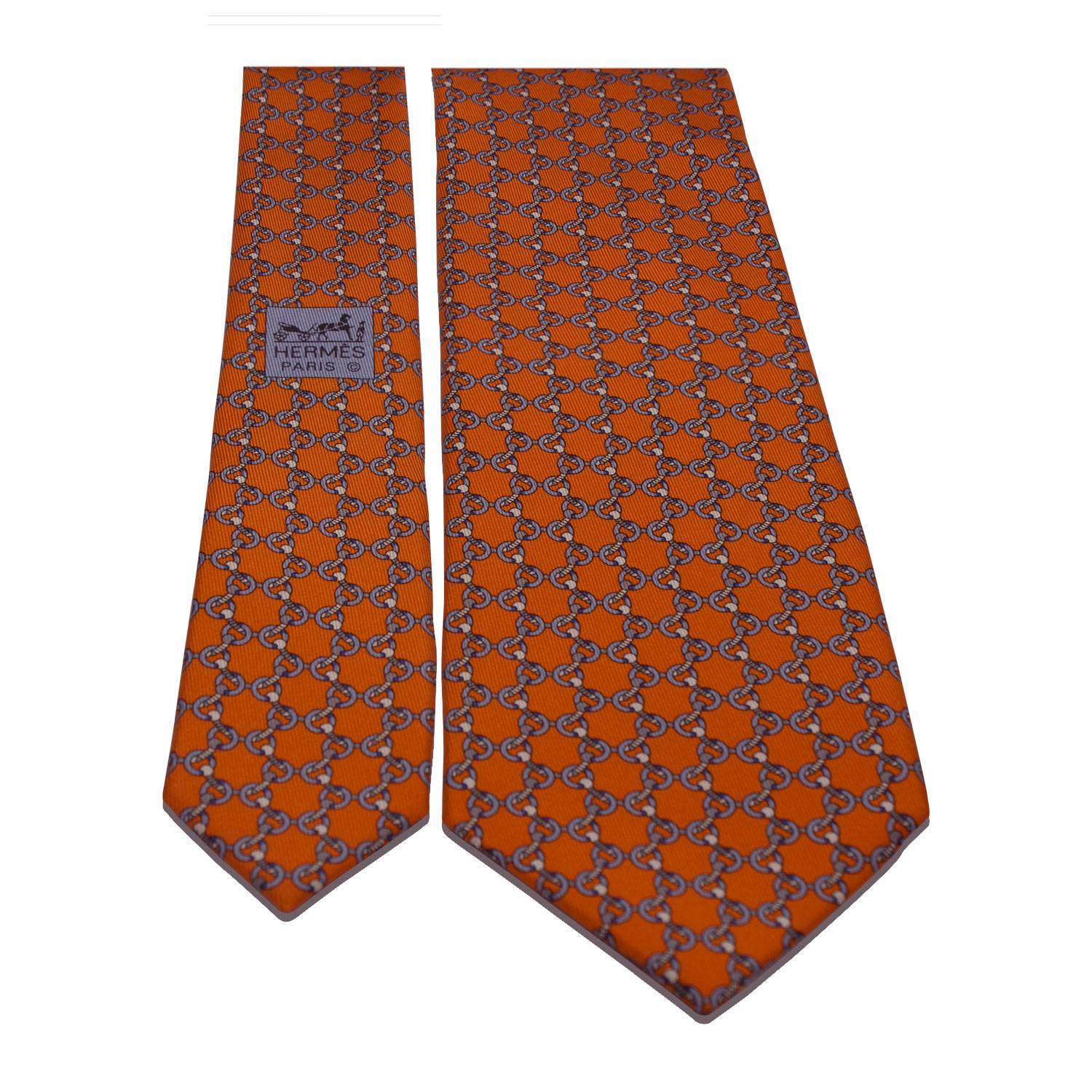 Hermes Cravate/Tie 100% Silk Le Piree Or 8cm Size Orange Vif/Ciel/Gris Clair Color 2016.

Pre-owned and never used. 
Bought it in Hermes store in 2016. 
Size: 8cm. 
Color: Orange Vif/Ciel/Gris Clair. 
Model: Le Piree Or.