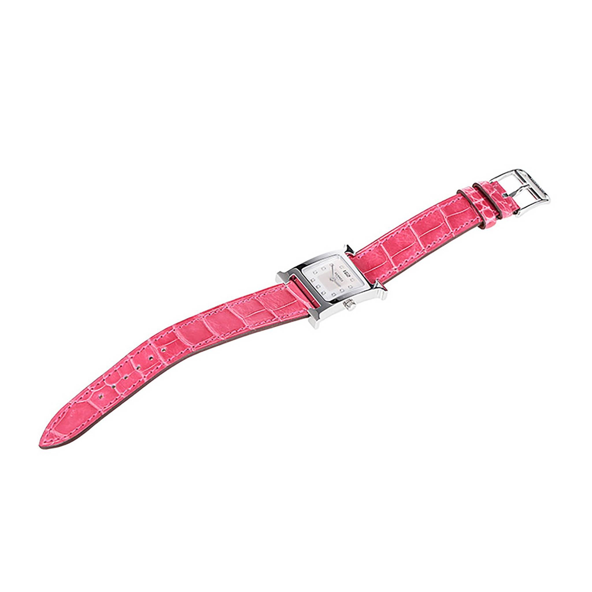 Hermes "Heure H" Watch 21 x 21 mm smooth raspberry alligator leather strap

Pristine condition. Pre-owned and never used

Model: Heure H

Hermes steel watch, 21 x 21mm,

white dial set with diamonds, quartz movement,

smooth raspberry