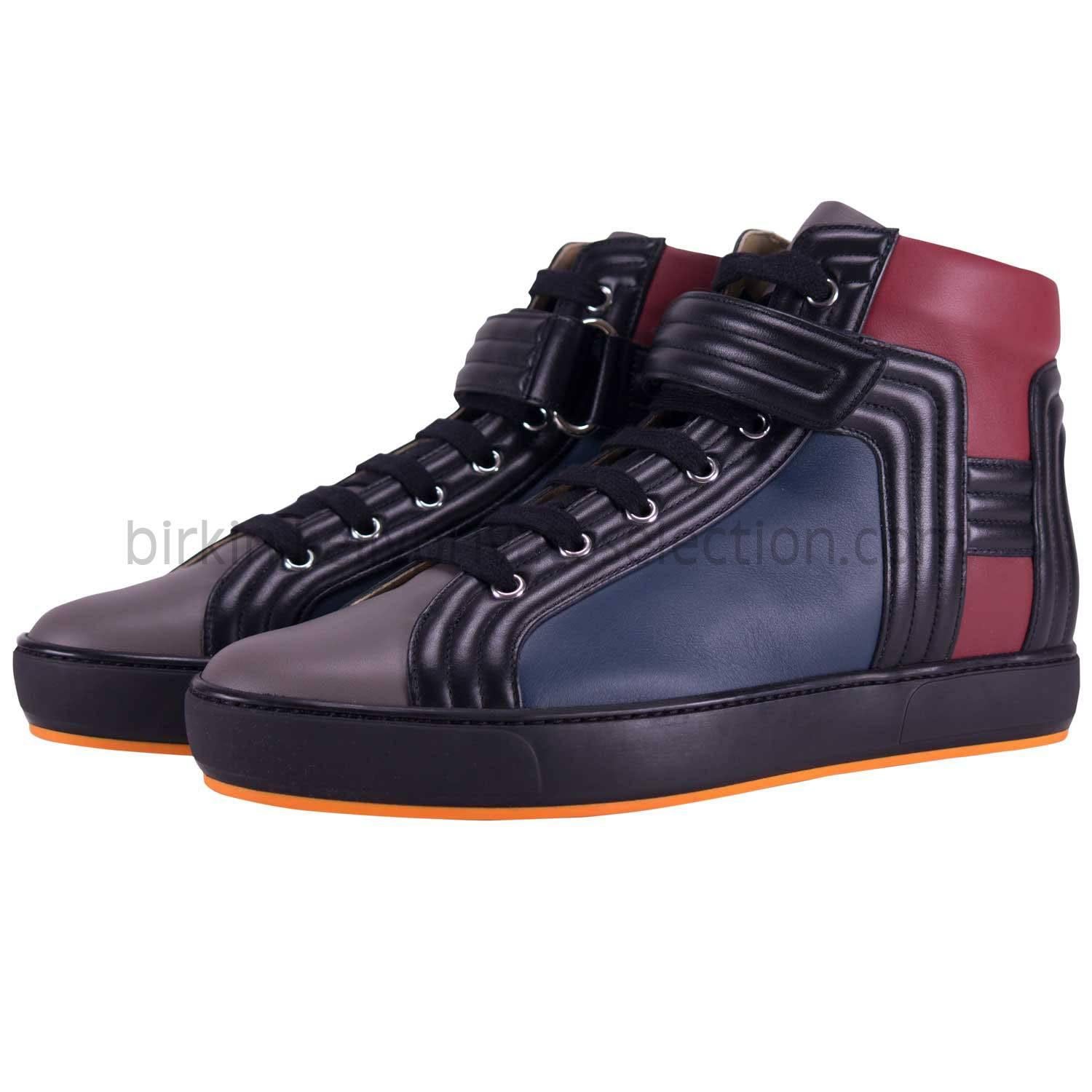 Hermes SPORT HOMME LIONS VEAU 42 Mole Prussia Red Black 2015.

Pre-owned and never used.

Bought it in hermès store in 2015.

Size: 42. 

Model; SPORT HOMME LIONS.

Color: TAUPE/PRUSSE/ROUGE/NOIR.

-Original Invoice.

-Shipment and