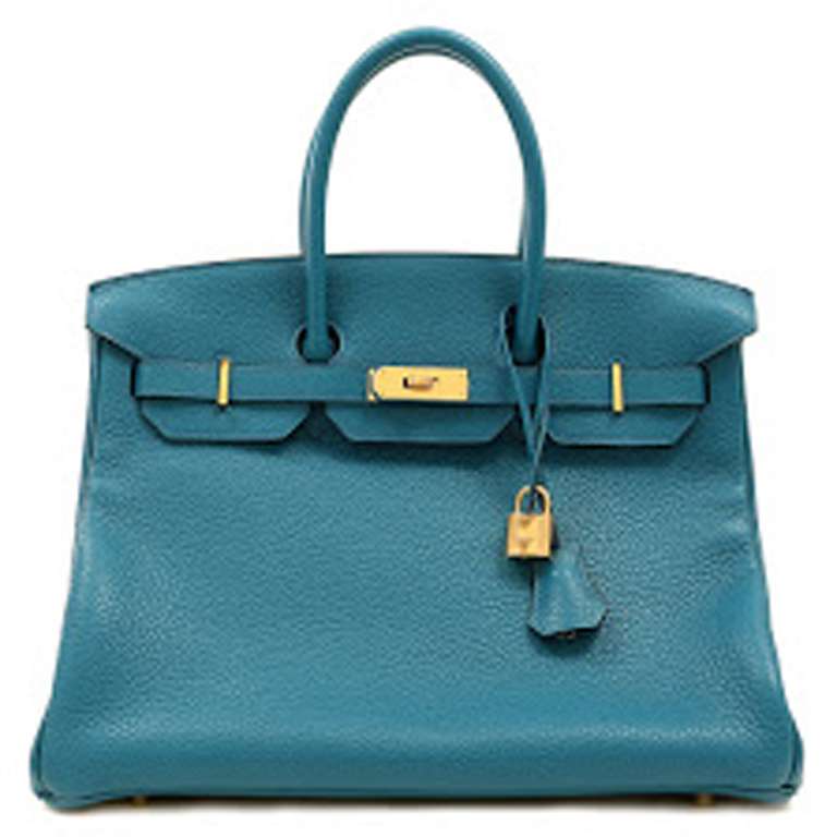 One Hermes Birkin Blue Izmir Togo Bag with Gold Hardware from 2013. This bag is 35cm.