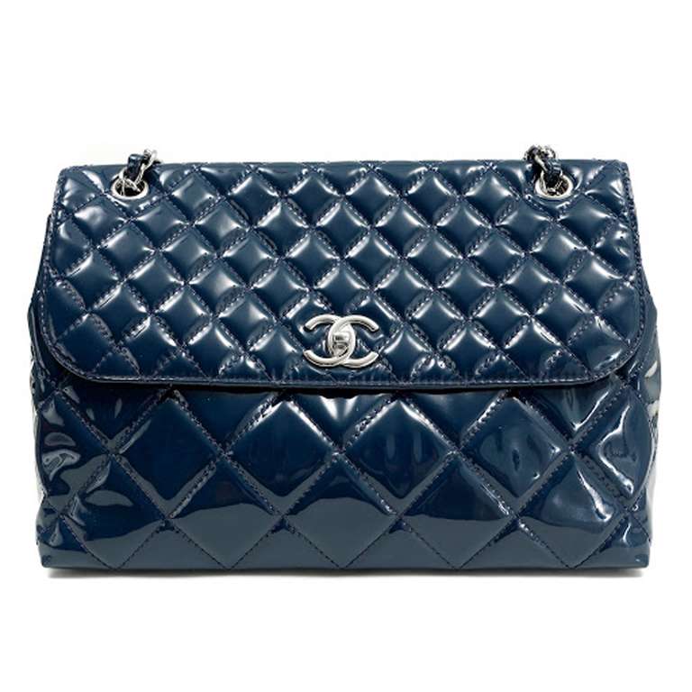One brand new Chanel Classic Blue Flap Bag from 2012.