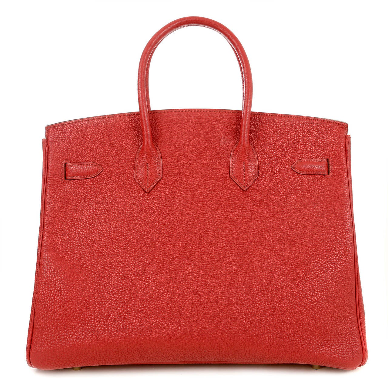 Hermès Red Togo Leather 35 cm Birkin- PRISTINE overall condition.  

Wait lists of a year or more are commonplace for the intensely coveted Birkin.  This particular Birkin is in Red Togo leather with gold hardware; a highly desirable and