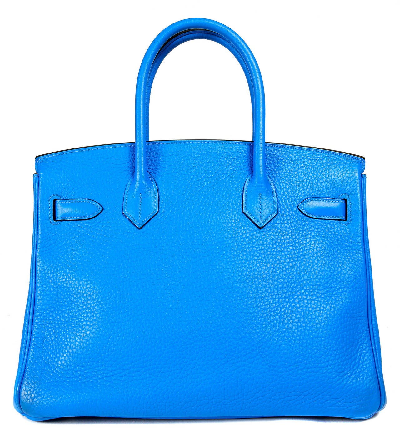 Hermès 30 cm Bleu Hydra Birkin-PRISTINE with the protective plastic intact on much of the hardware.  
 Considered the ultimate luxury item the world over and hand stitched by skilled craftsmen, wait lists for the Birkin often exceed a year or