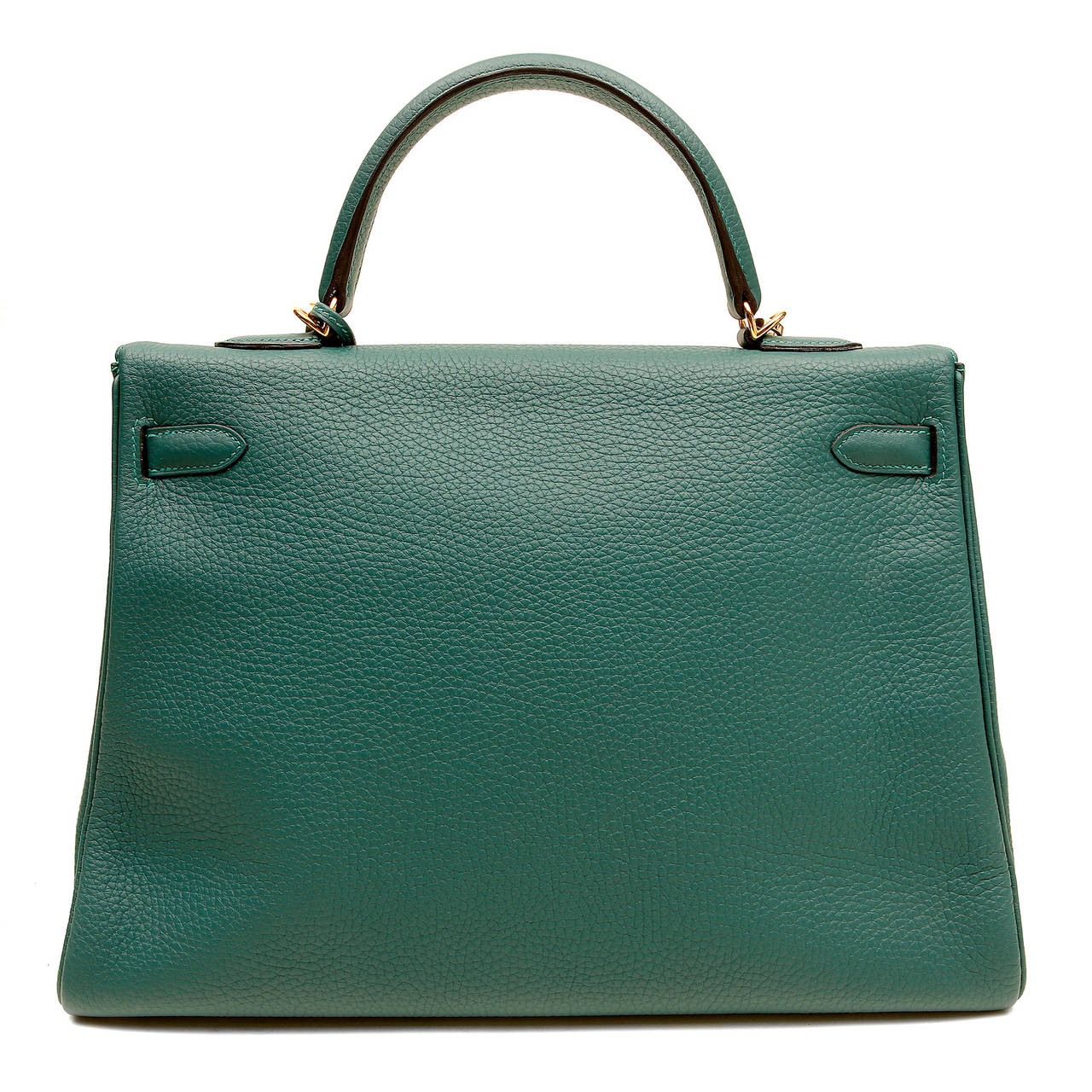 Hermès Malachite Togo 35 cm Kelly-  PRISTINE
 Never before Carried with the protective plastic still intact on the closure hardware
  Hermès bags are considered the ultimate luxury item worldwide.  Each piece is handcrafted with waitlists that