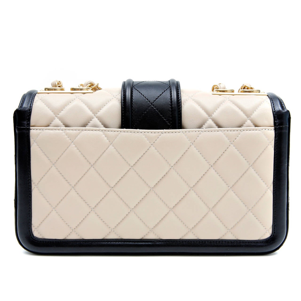 Chanel Beige and Black Leather Flap Bag- PRISTINE; never carried. 

 The sophisticated silhouette is perfectly scaled in the medium size.  Very versatile, it is certain to become a favorite in any collection.
 
Light beige  leather is quilted in