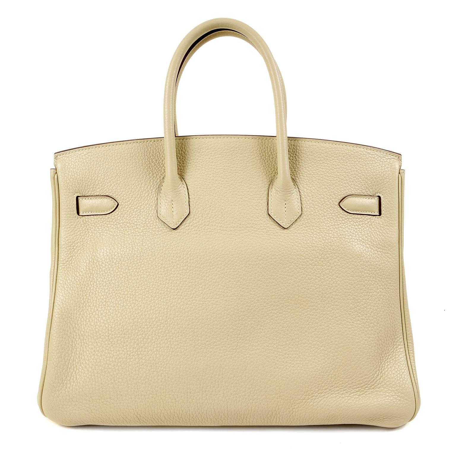 Hermès Parchemin Clemence Leather 35 cm Birkin is in pristine condition.   Hermès bags are considered the ultimate luxury item the world over.  Hand stitched by skilled craftsmen, wait lists of a year or more are commonplace.  This particular