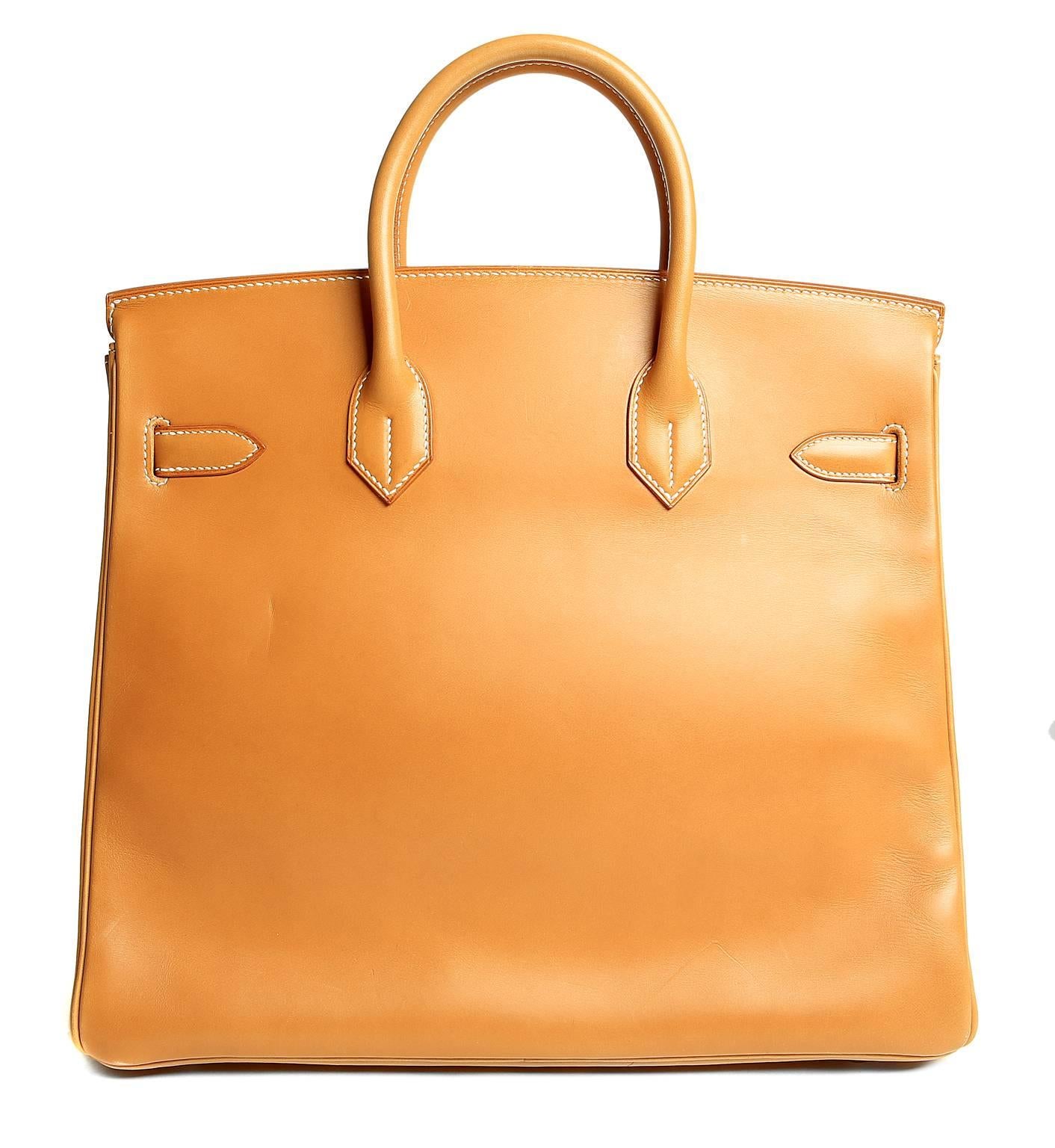 Hermès Barenia Natural 32 cm HAC  Birkin- PRISTINE;  appears never before carried.
 Considered the ultimate luxury item the world over and hand stitched by skilled craftsmen, wait lists of a year or more are commonplace for Hermès bags. The Haut