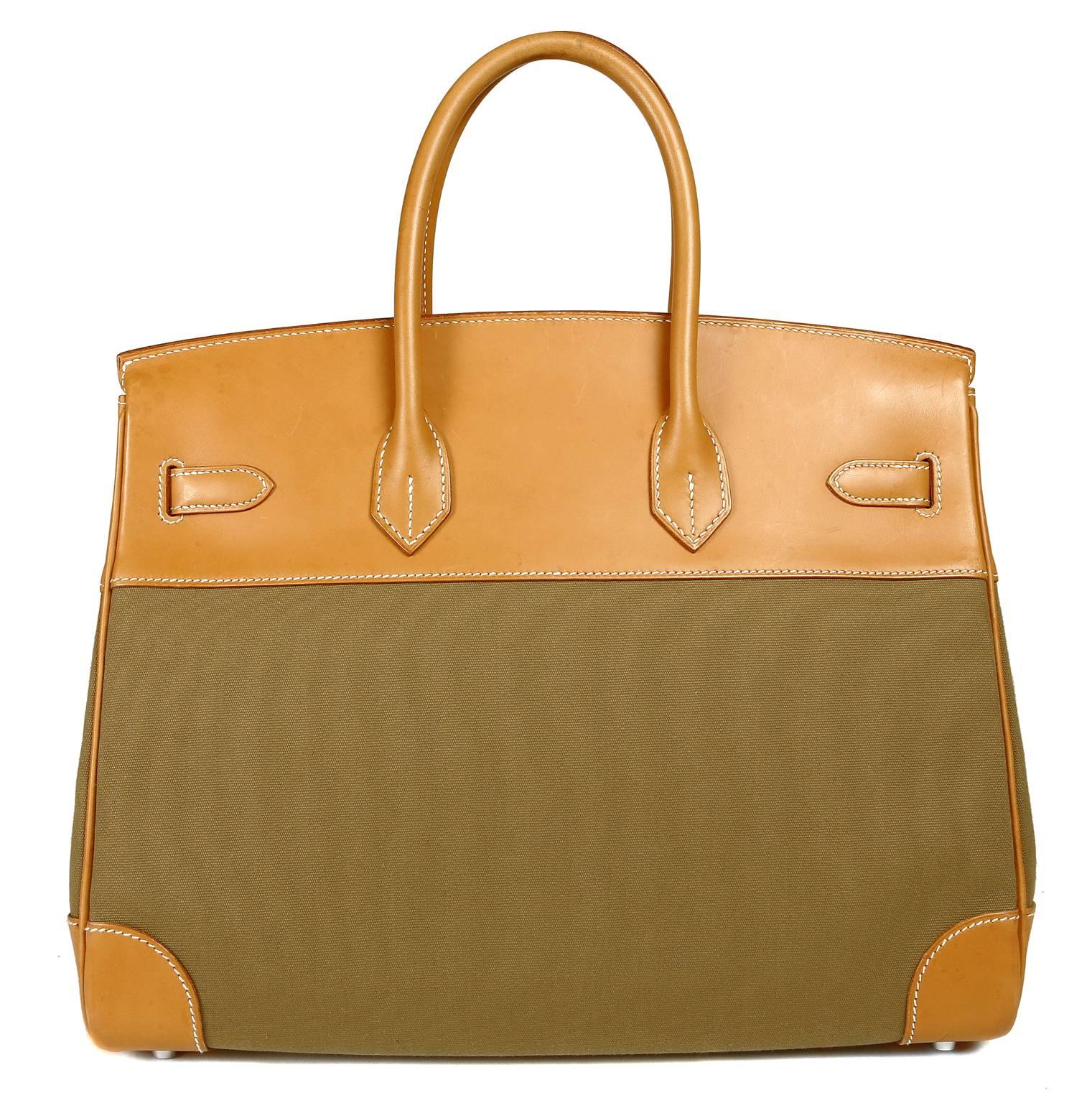 Hermès Barenia and Canvas 35 cm Birkin- Pristine condition.
  Considered the ultimate luxury item worldwide, waitlists for the Birkin can often exceed a year.  This classic piece is handcrafted in Barenia leather with olive toile fabric body.
