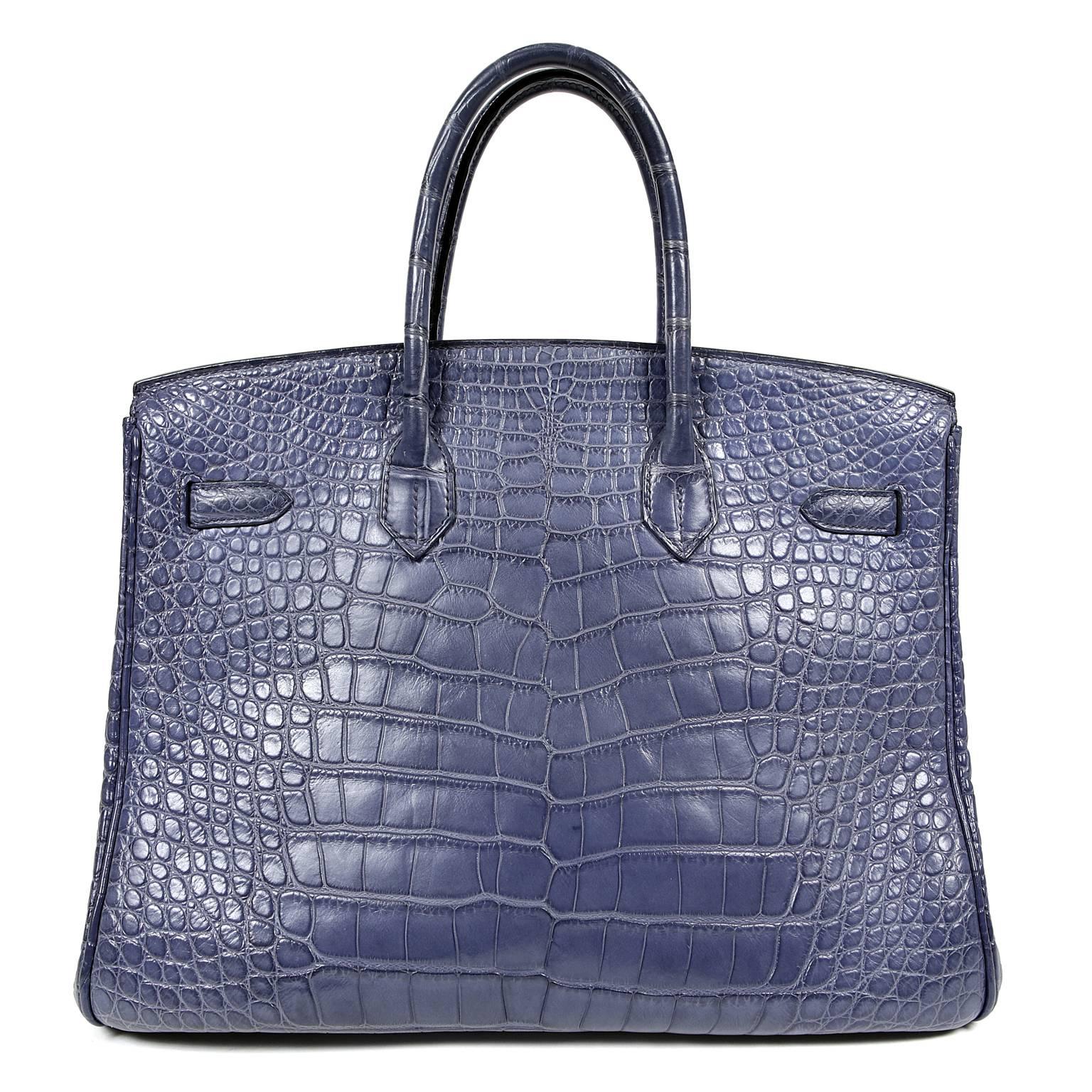 Hermès 35 cm Brighton Blue Alligator Birkin Bag- PRISTINE
Hermès bags are considered the ultimate luxury item the world over.  Hand stitched by skilled craftsmen, wait lists of a year or more are commonplace for the leather versions.  An exotic