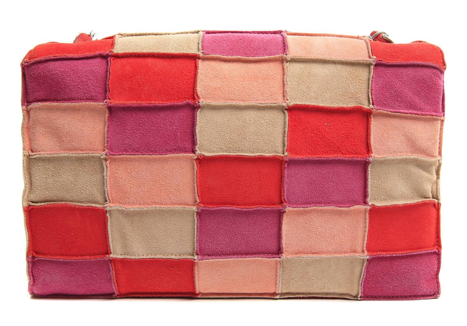 Chanel Multicolor Suede Patchwork Flap Bag
 Pristine- most likely never carried.  
Featuring an array of warm toned cheerful colored suede blocks, this unique Chanel is a fantastic find.
 
Sublimely soft suede is stitched in a rectangular color