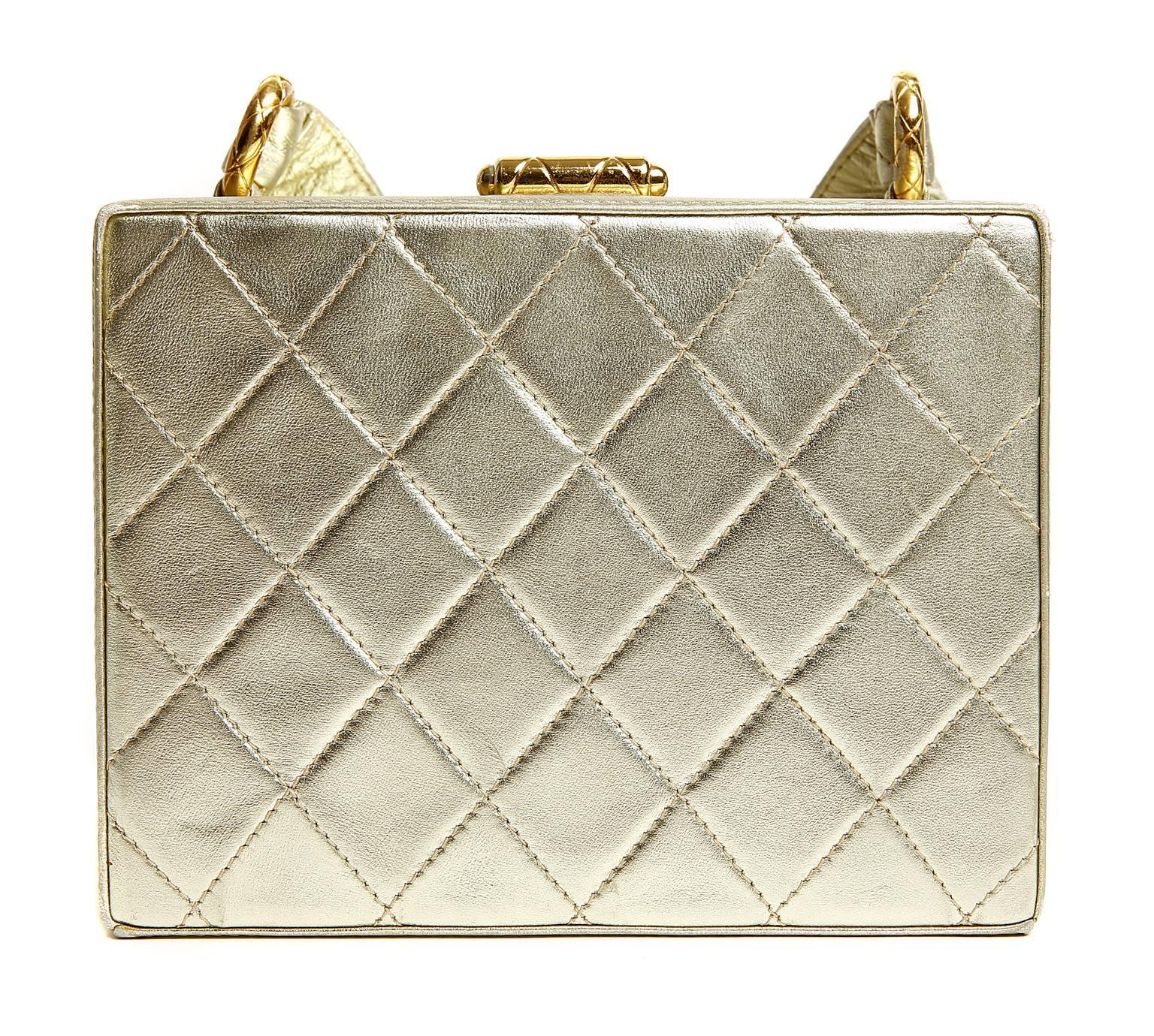 Chanel Platinum Leather Box Bag- nearly pristine condition
 The soft metallic complements any other color and the unique silhouette can be either formal or edgy, depending on the setting.
 
Platinum gold leather box shaped bag is quilted in