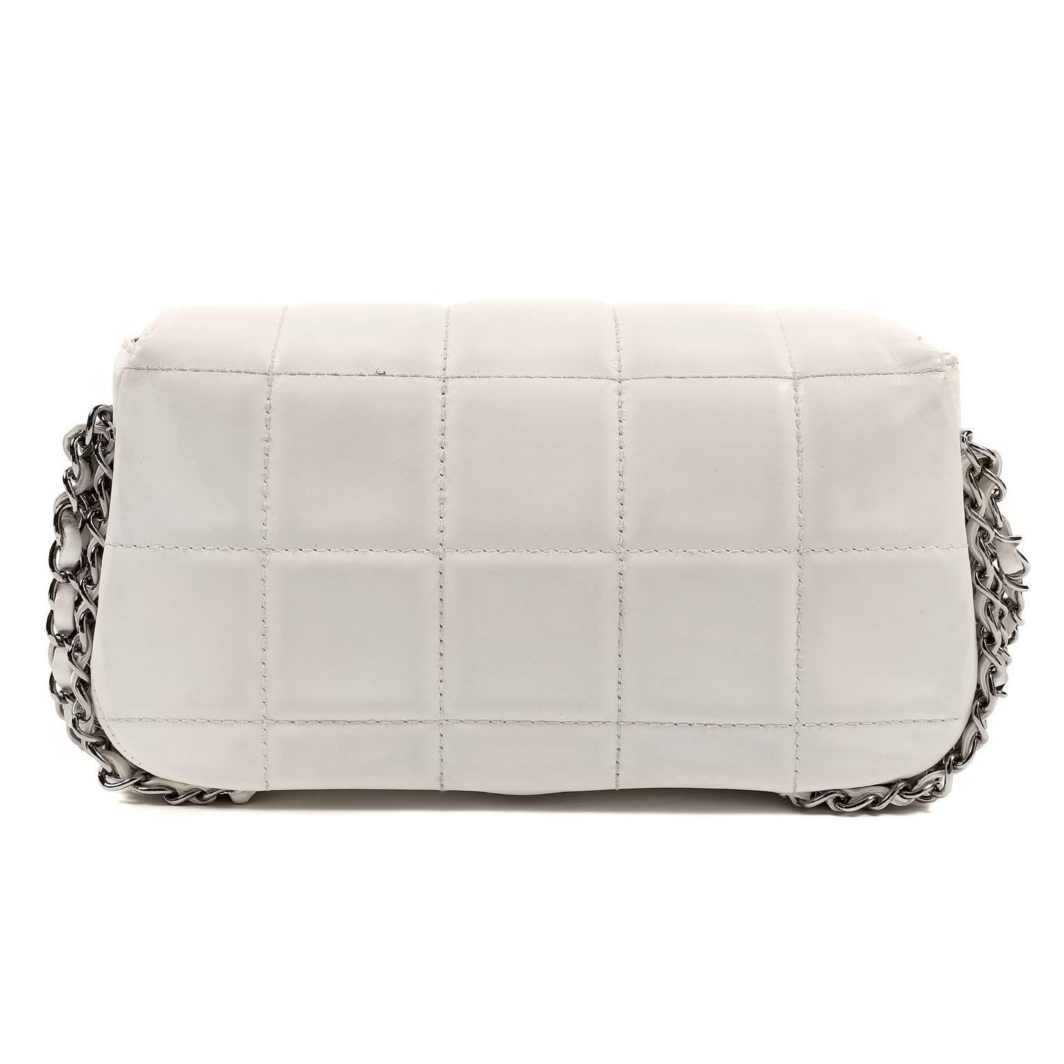 Chanel White Multi Chain Classic Flap is a special edition runway piece in excellent condition.  Edgy chain details combine with classic Chanel design elements for a spectacular collectible piece.
 
White leather is quilted in Hershey square