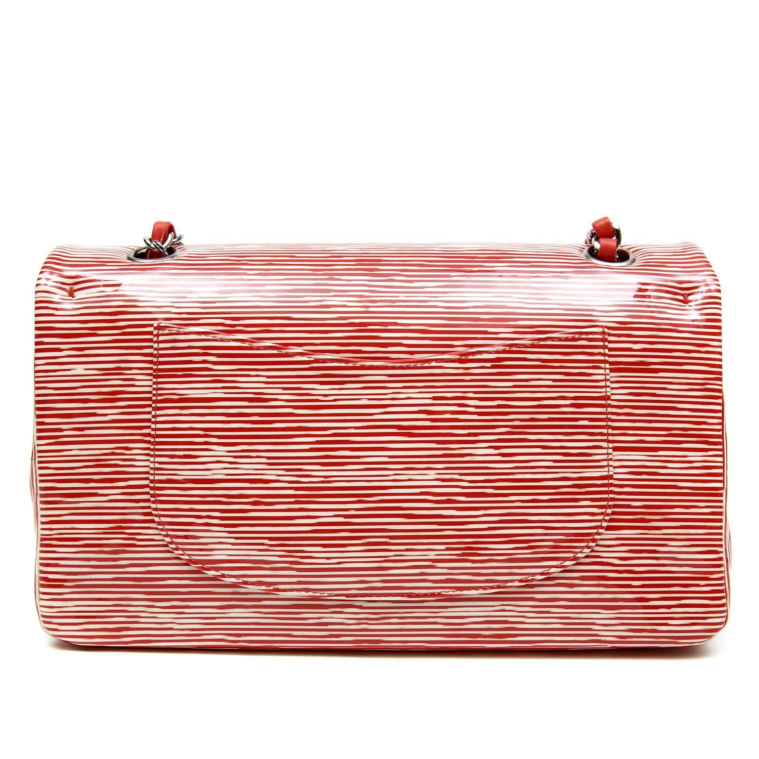 Chanel Patent Leather Candy Cane Classic Flap- PRISTINE
 The unique variegated striping on this piece makes it a must have for any collection. 

Glossy patent leather medium double flap is covered in red and white uneven striping evoking images