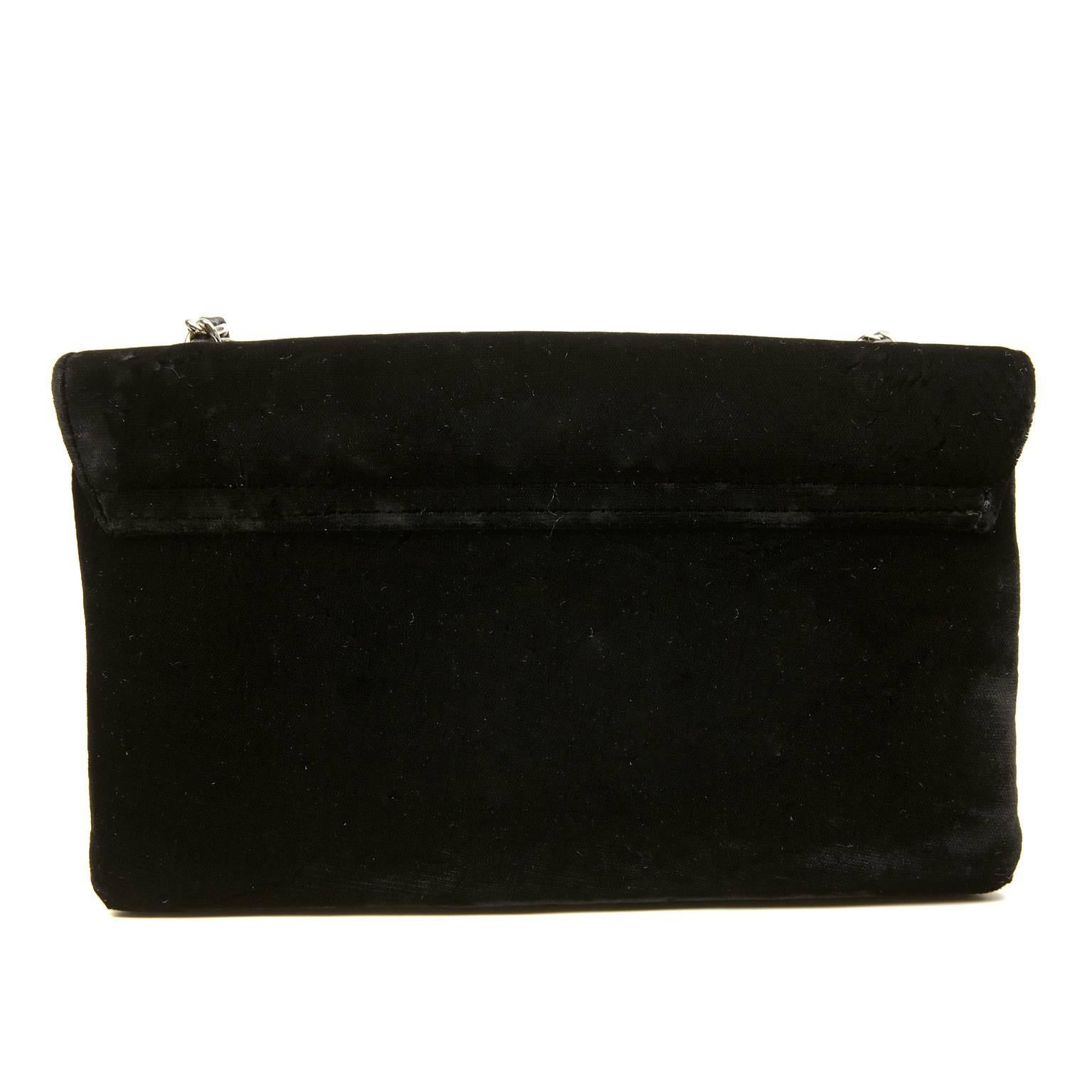 Chanel Black Velvet Precious Symbols Evening Bag- PRISTINE
 A roomy width and a double pouch design make this piece a perfect size; it fits more than just a lipstick.  

Soft black velvet simple flap bag is accented with black leather iconic