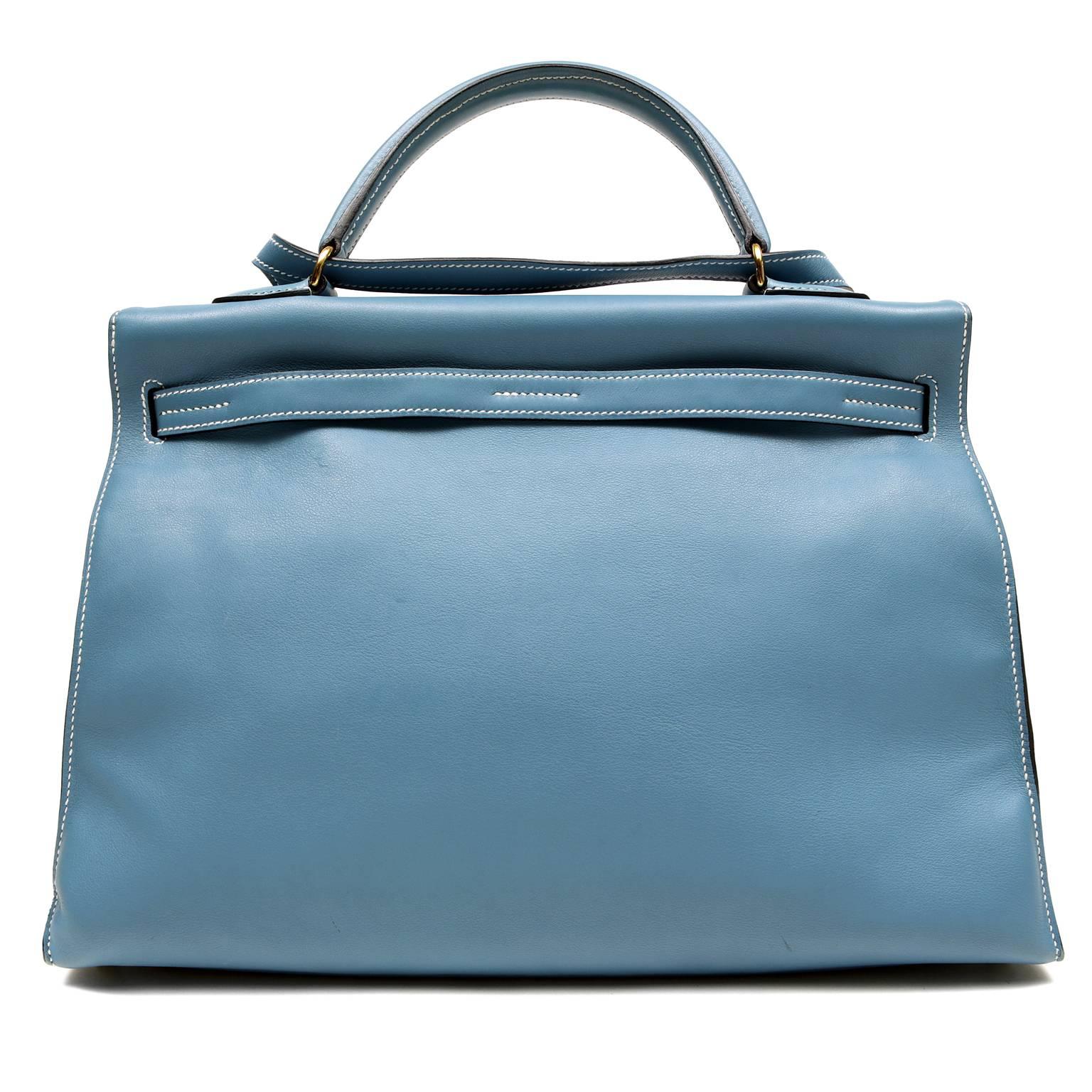 Hermès Blue Jean 35 cm Collapsible Kelly Flat - PRISTINE
Hermès bags are considered the ultimate luxury item worldwide.  Each piece is handcrafted with waitlists that can exceed a year or more.  The demure Kelly style is always in high demand. 