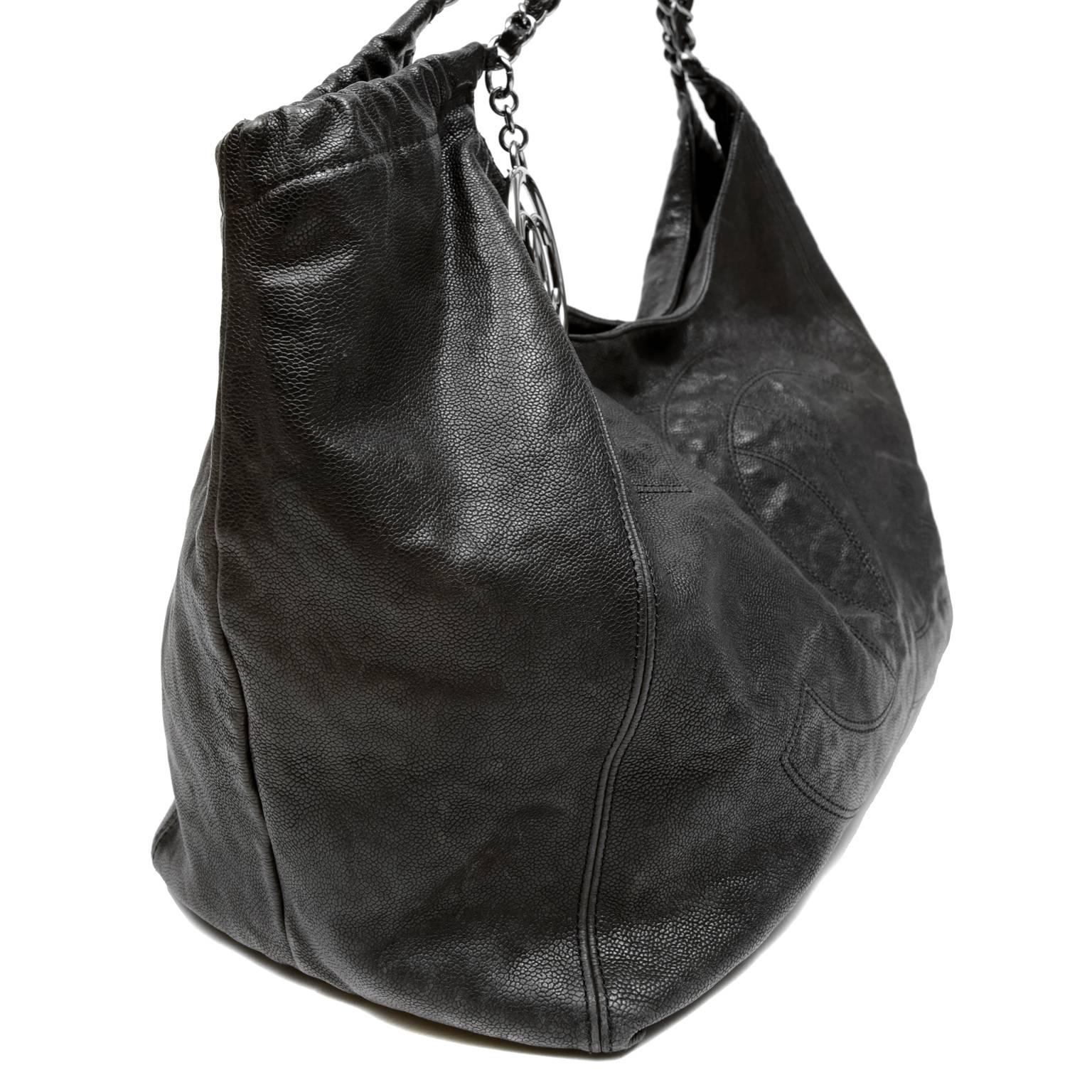 Chanel Black Caviar Coco Cabas Tote- EXCELLENT PLUS
The highly coveted style sold out everywhere and remains a fabulous everyday piece for any collection.  
Intentionally distressed black caviar leather is textured and durable.  Colossal