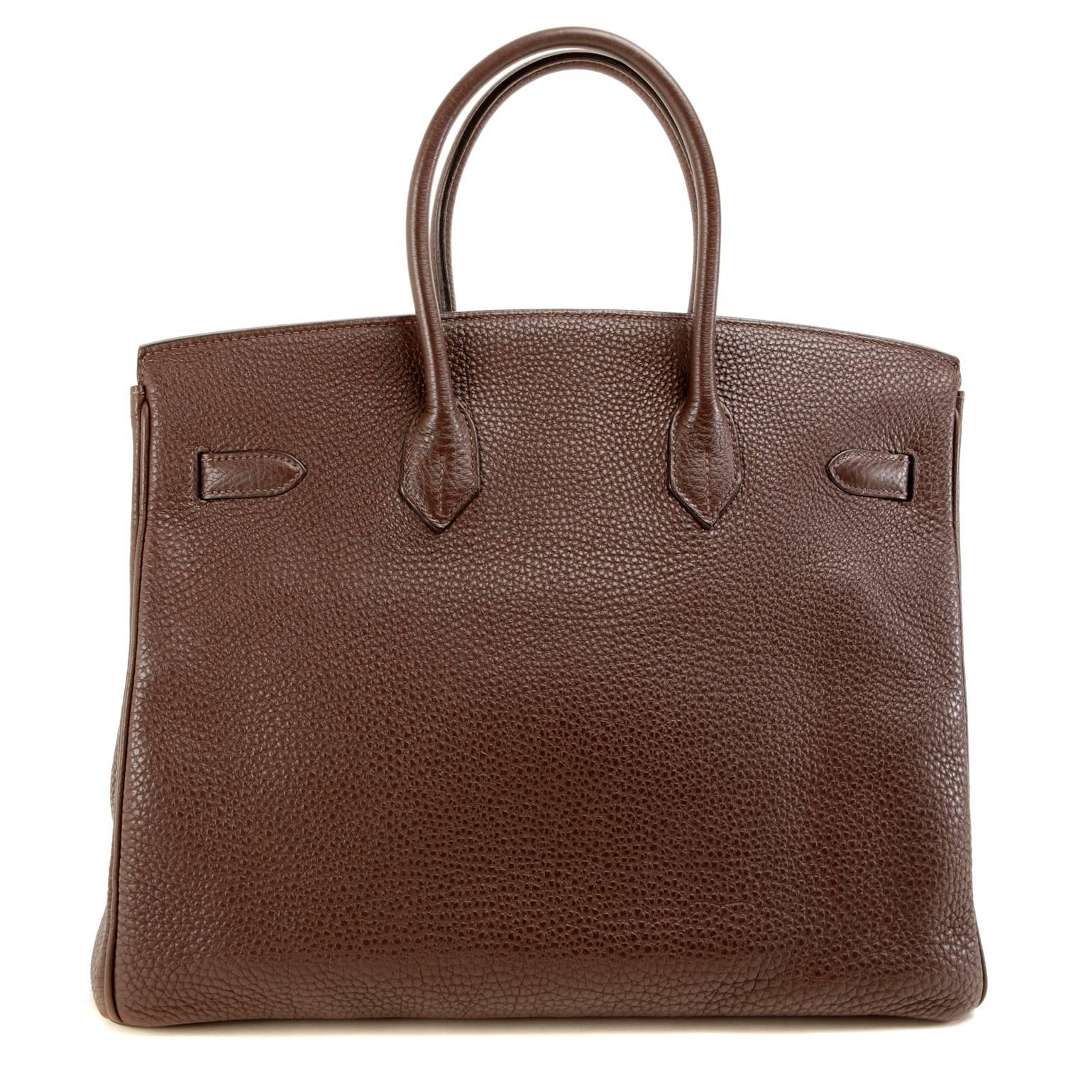 Hermès Chocolate Brown 35 cm Birkin Bag, GHW- EXCELLENT PLUS   Hermès bags are considered the ultimate luxury item the world over.  Hand stitched by skilled craftsmen, wait lists of a year or more are commonplace.  This particular Birkin is in