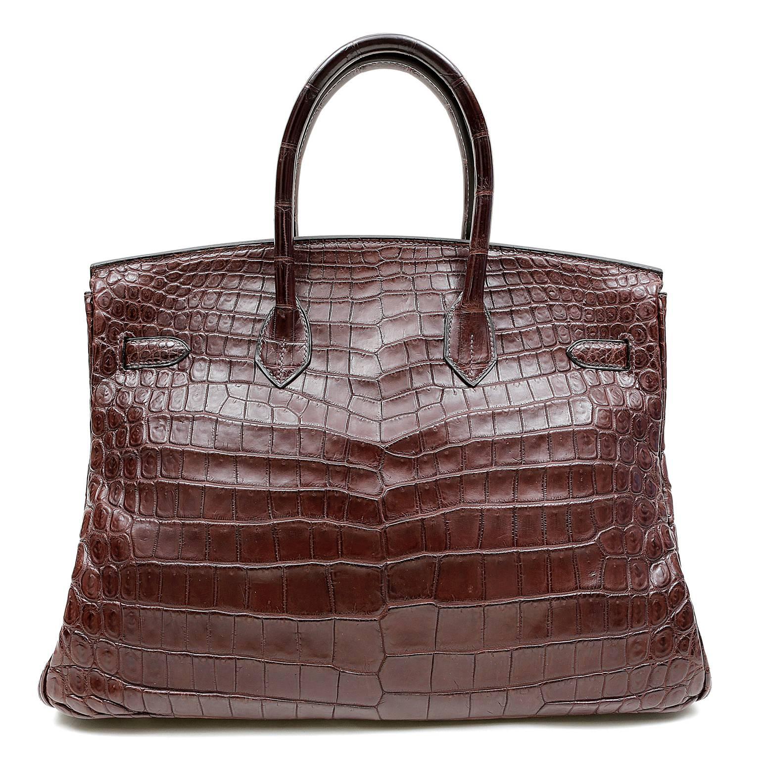 Hermès Ebene Niloticus Crocodile 35cm Birkin- Pristine conditon
  Incredibly rare and specially ordered, this exotic Birkin is truly stunning in deep brown Ebene croc with Palladium hardware.  

Hermès bags are considered the ultimate luxury