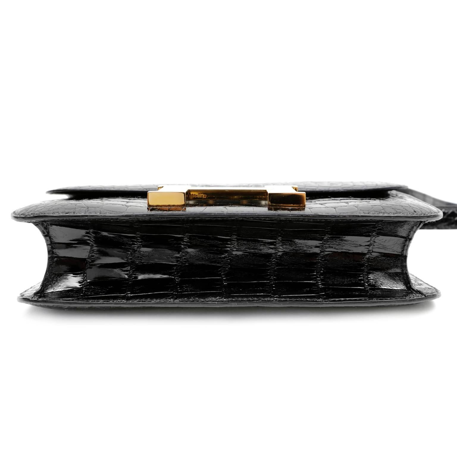 Women's Hermès Black Alligator Constance Bag- 23 cm with Gold Hardware