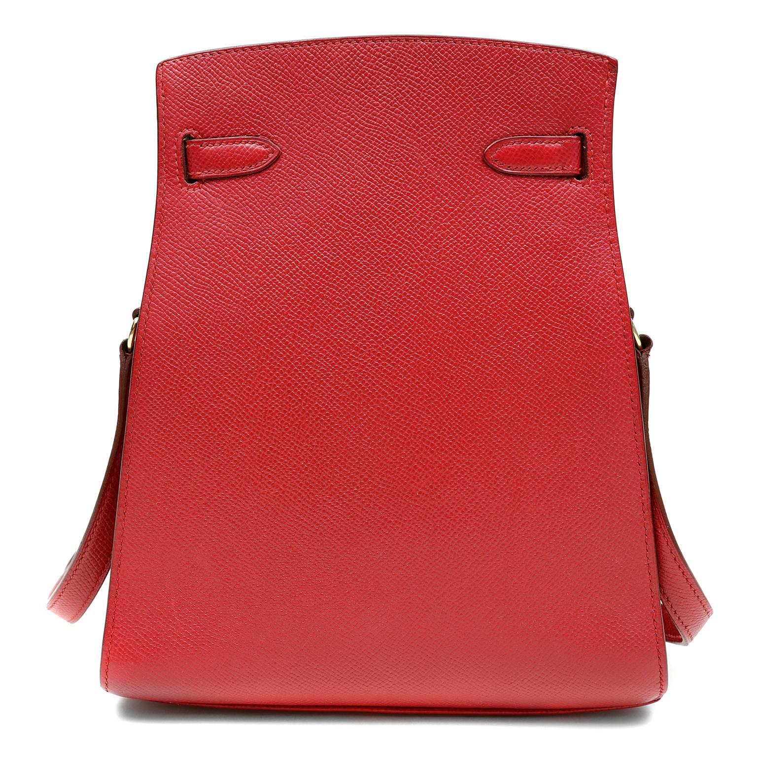 Hermès Red Epsom Kelly Sport- EXCELLENT PLUS
  The small vertical style features the iconic Kelly belted closure with an adjustable shoulder strap allowing for cross body wear. 

Lipstick red Epsom leather is accented with warm gold hardware. 