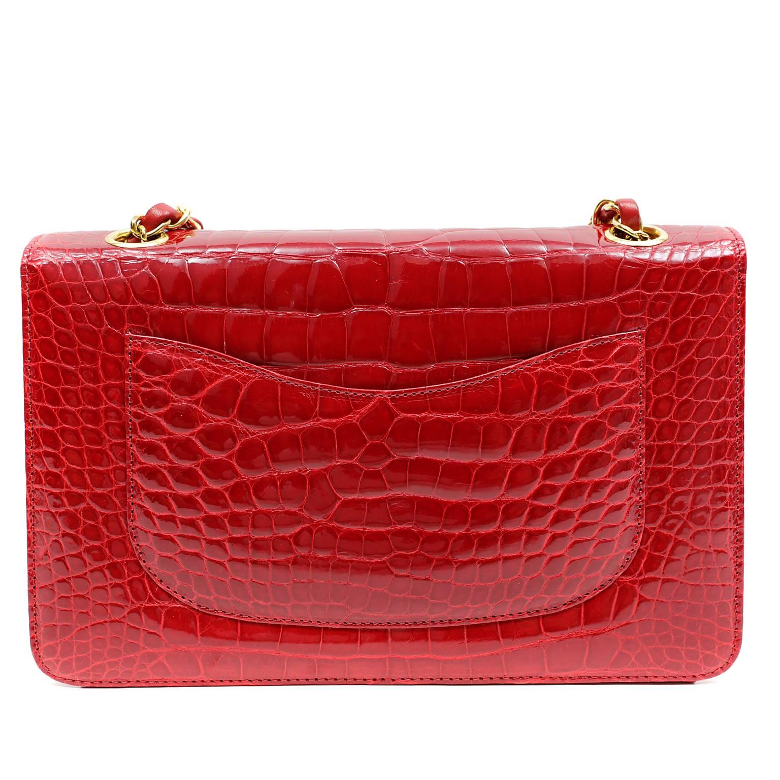 Chanel Red Crocodile Medium Classic Flap- PRISTINE
  The timeless silhouette is incredibly rare in exotic crocodile; truly beautiful and extremely collectible.
Red crocodile skin with gold interlocking cc twist lock on single flap.  Leather and