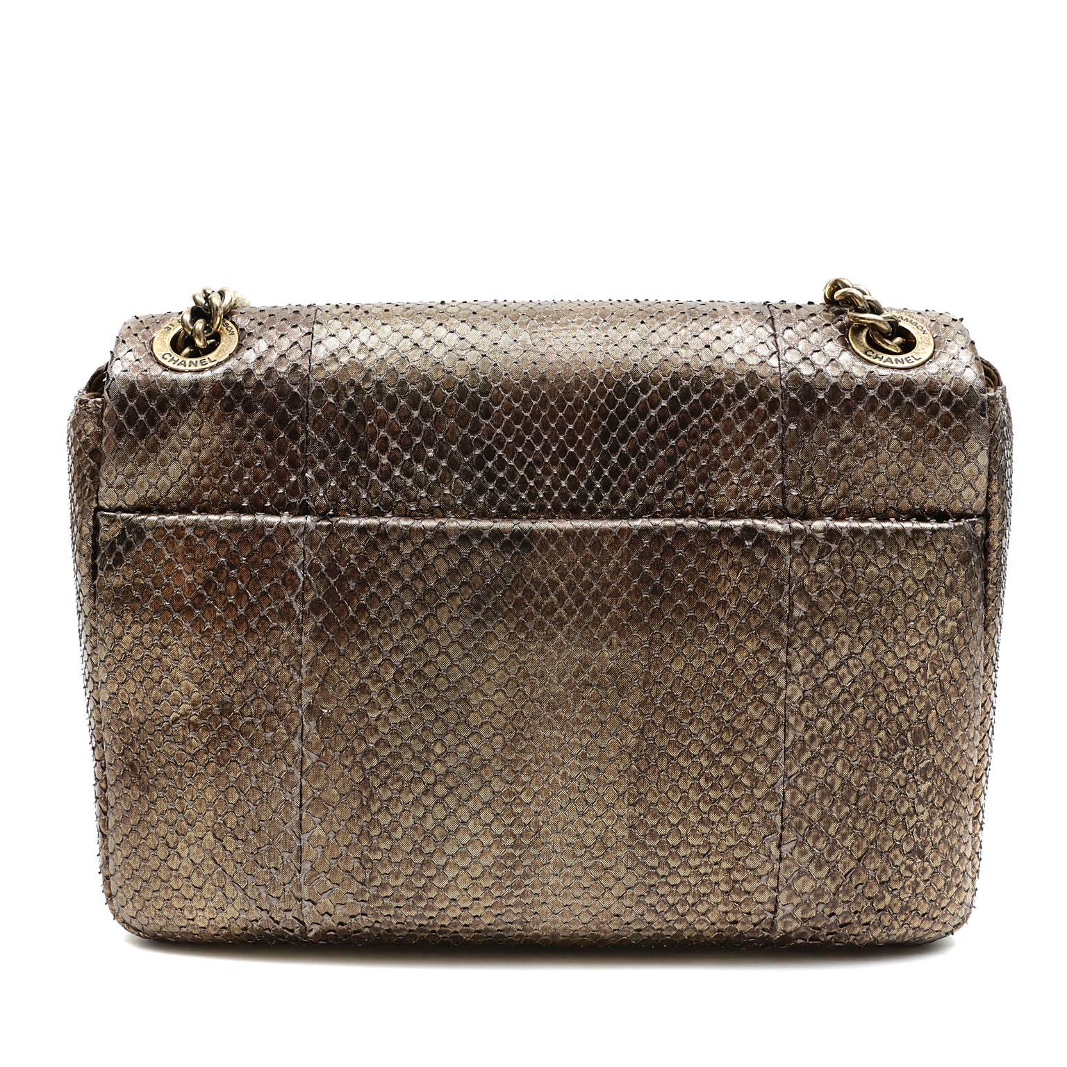 Chanel Dark Gold Python Shanghai Flap Bag- PRISTINE 
 Neutral yet dramatic in a subtle metallic exotic- a must have for collectors.  

Golden bronze python skin medium flap bag is accented with antiqued gold hardware.  Unique hinged CC plaque